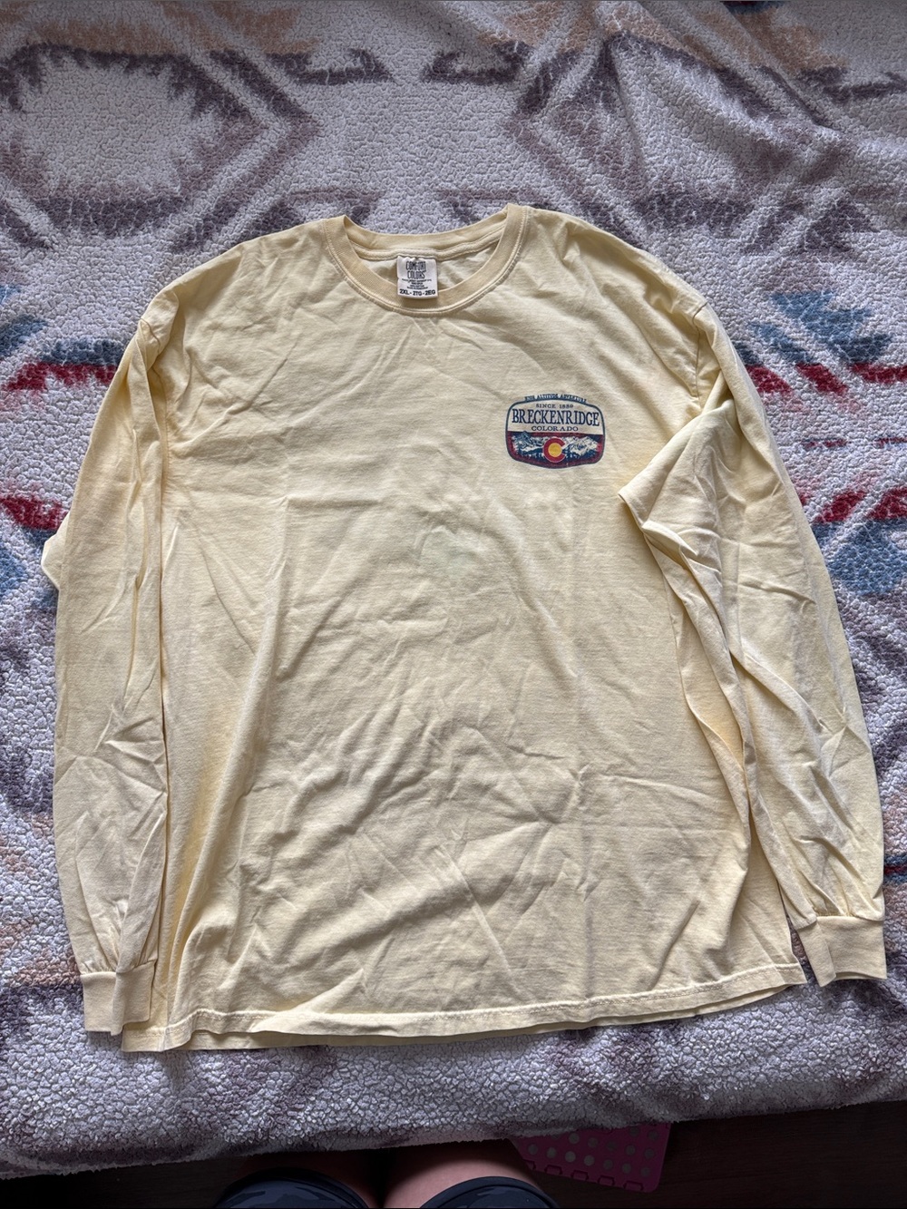 Comfort Colors Pale Yellow Long Sleeve Crewneck with Embroidered Chest Patch